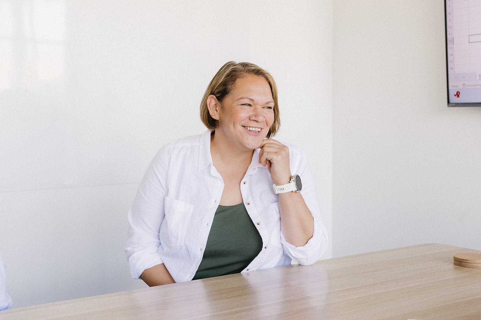 Apex Advice Professional woman smiling during financial planning consultation with Geelong financial adviser